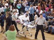 Woman taken away on stretcher at Barack Obama's presidential campaign rally in Minges Coliseum